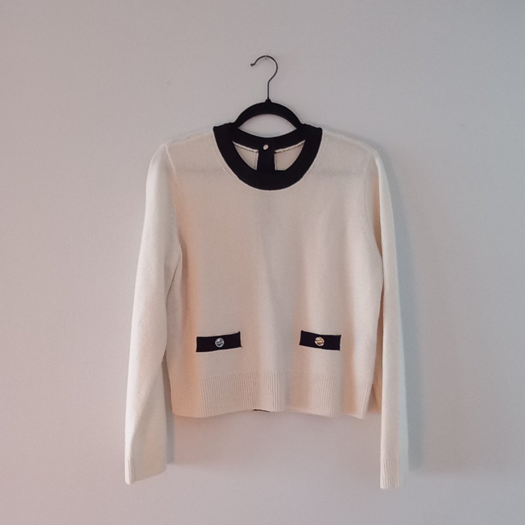 Elegant Cream Sweater With Black Accents
